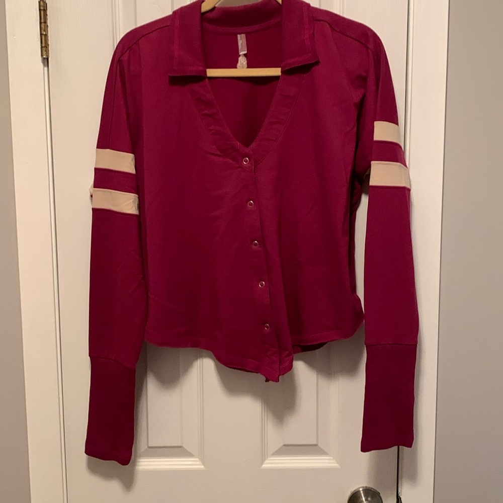 In Beautiful Condition Free People Size M cute top with thumb whole
